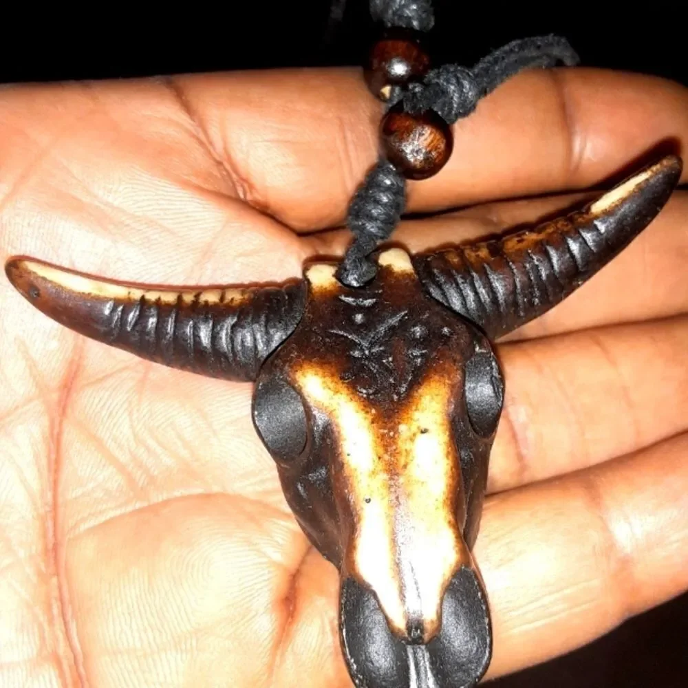 Hand CRAFTED UNISEX brown bull head pendant with adjustable necklace